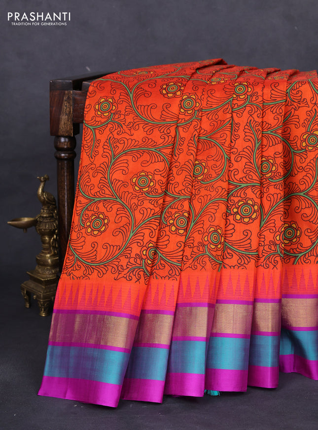 Silk cotton saree orange and purple with allover kalamkari prints and temple design zari woven simple border