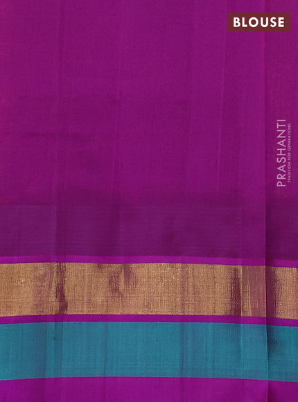 Silk cotton saree orange and purple with allover kalamkari prints and temple design zari woven simple border