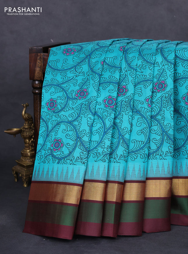Silk cotton saree teal blue and deep maroon with allover kalamkari prints and temple design zari woven simple border
