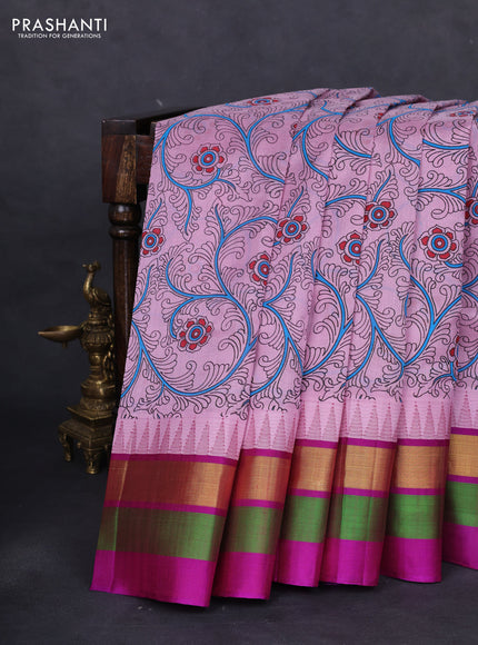 Silk cotton saree pastel pink and purple with allover kalamkari prints and temple design zari woven simple border
