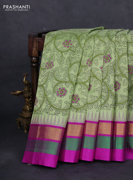 Silk cotton saree pista green and purple with allover kalamkari prints and temple design zari woven simple border