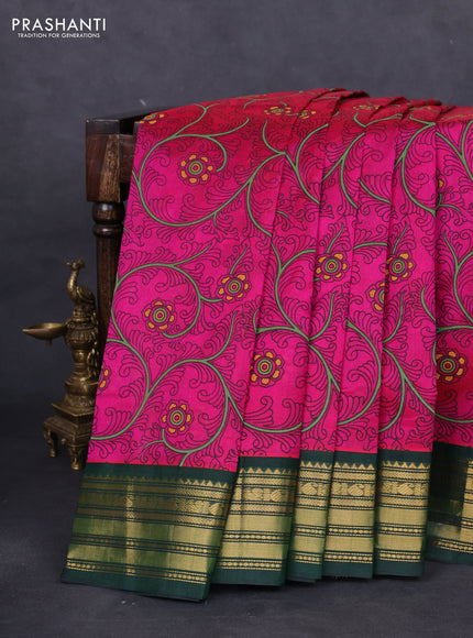 Silk cotton saree magenta pink and dark green with allover kalamkari prints and zari woven korvai border