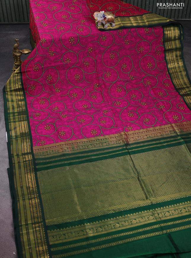 Silk cotton saree magenta pink and dark green with allover kalamkari prints and zari woven korvai border