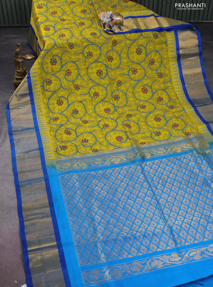 Silk cotton saree lime yellow and cs blue with allover kalamkari prints and temple design zari woven simple border