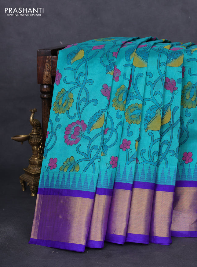 Silk cotton saree teal blue and blue with allover kalamkari prints and temple design zari woven simple border