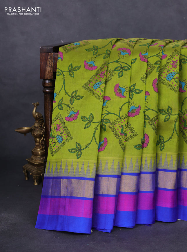 Silk cotton saree mehendi green and blue with allover kalamkari prints and temple design zari woven simple border