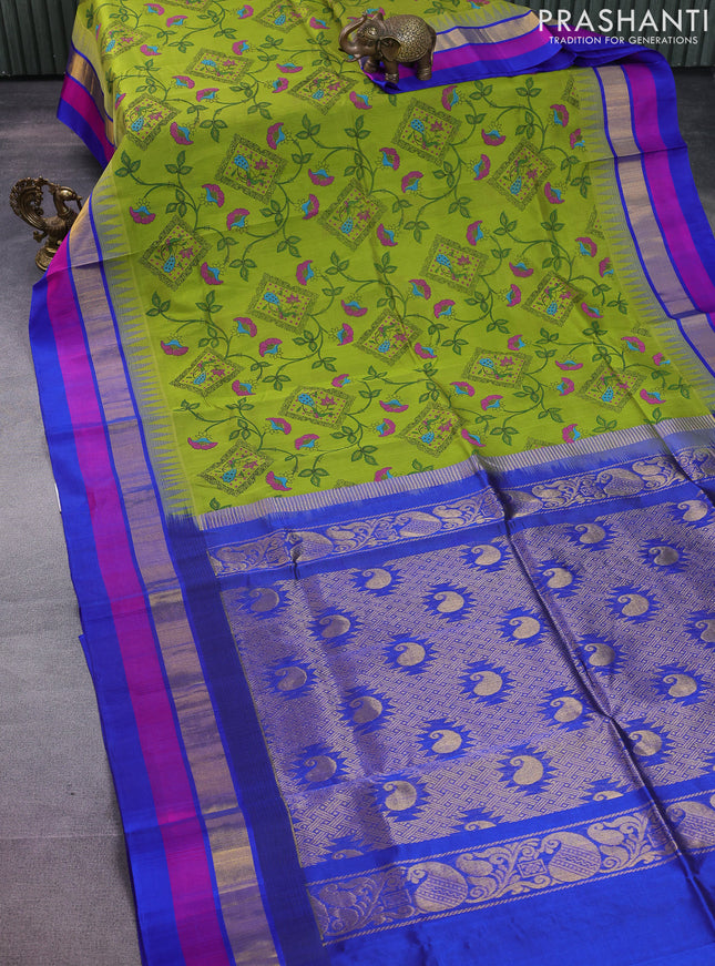 Silk cotton saree mehendi green and blue with allover kalamkari prints and temple design zari woven simple border