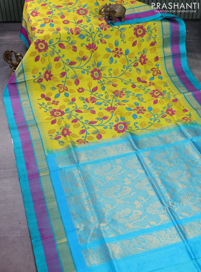 Silk cotton saree yellow and teal blue with allover kalamkari prints and temple design zari woven simple border