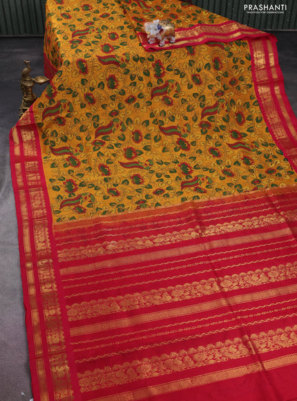 Silk cotton saree mango yellow and red with allover kalamkari prints and zari woven korvai border