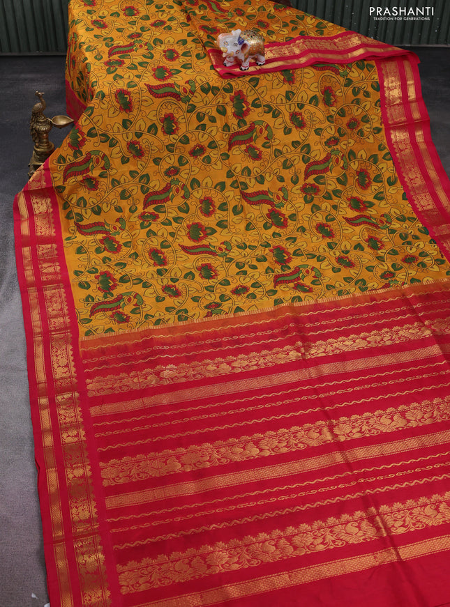 Silk cotton saree mango yellow and red with allover kalamkari prints and zari woven korvai border