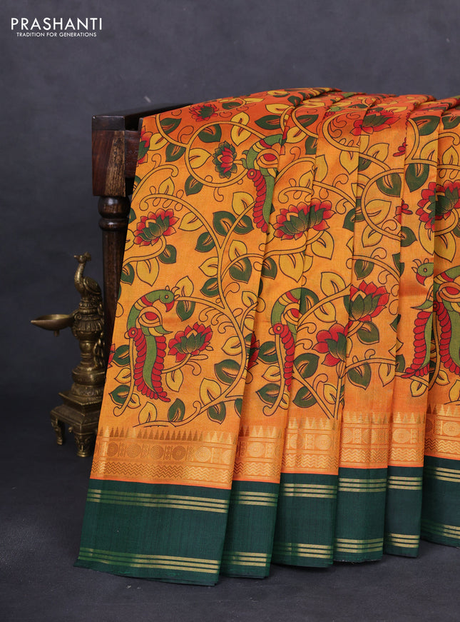 Silk cotton saree mango yellow and green with allover kalamkari prints and temple design zari woven border