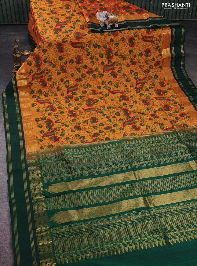 Silk cotton saree mango yellow and green with allover kalamkari prints and temple design zari woven border