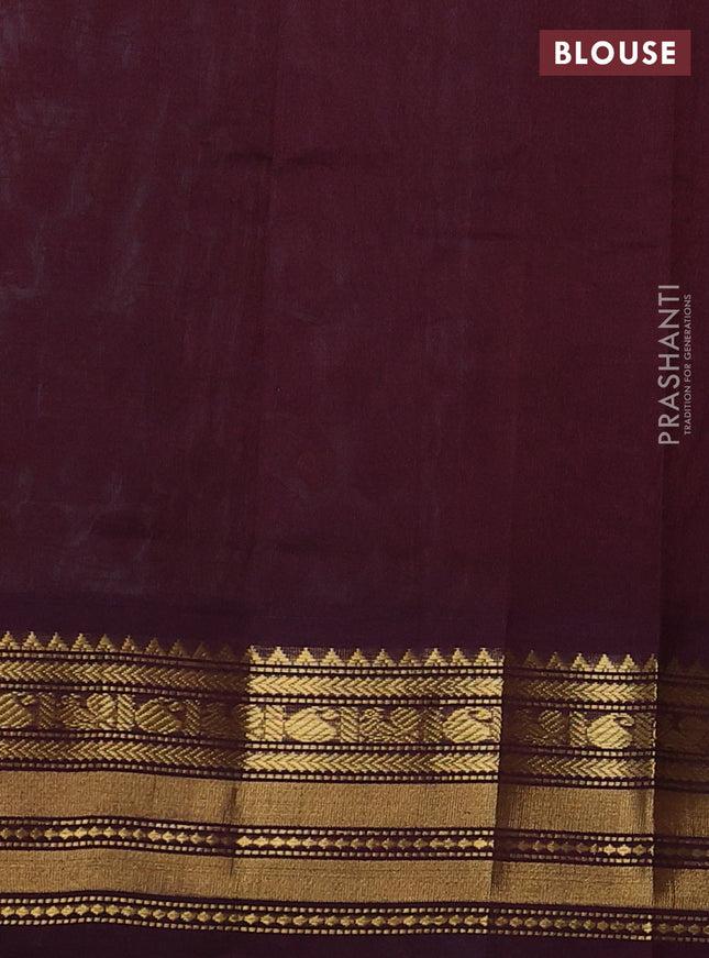 Silk cotton saree teal blue and deep maroon with allover kalamkari prints and zari woven korvai border