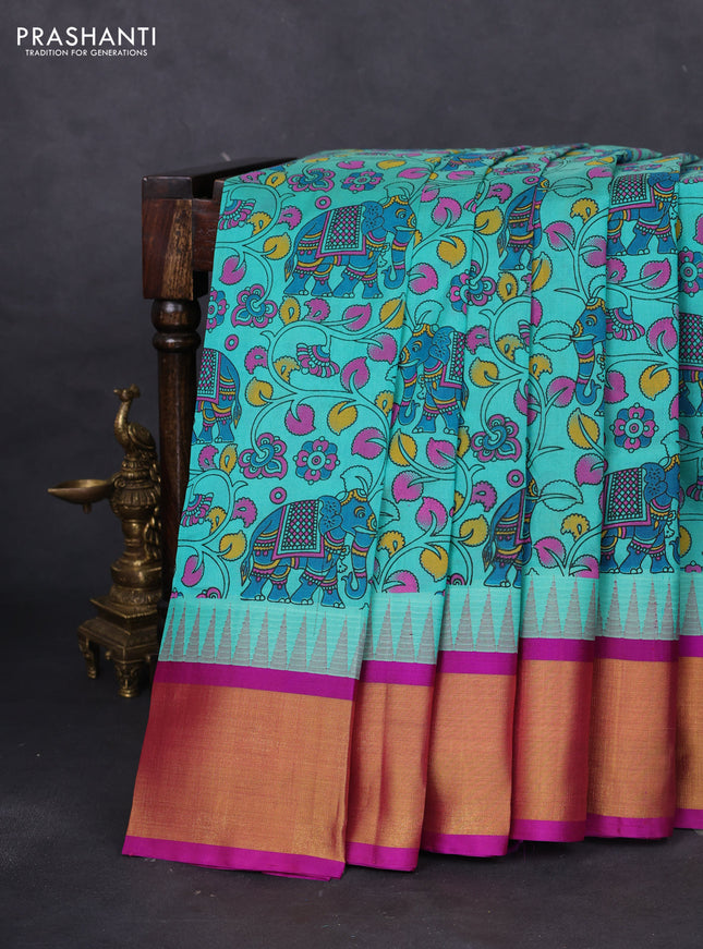 Silk cotton saree teal blue and purple with allover kalamkari prints and temple design zari woven border