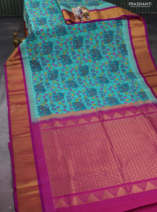 Silk cotton saree teal blue and purple with allover kalamkari prints and temple design zari woven border