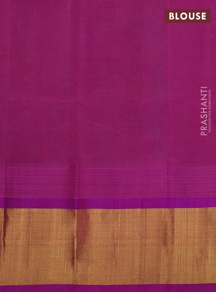 Silk cotton saree teal blue and purple with allover kalamkari prints and temple design zari woven border