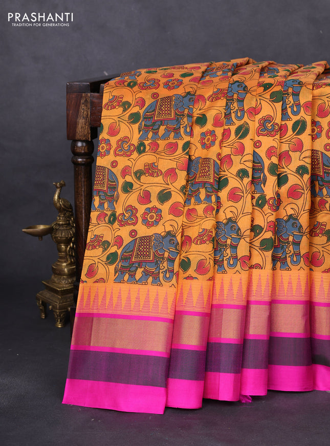 Silk cotton saree orange and pink with allover kalamkari prints and temple design zari woven simple border
