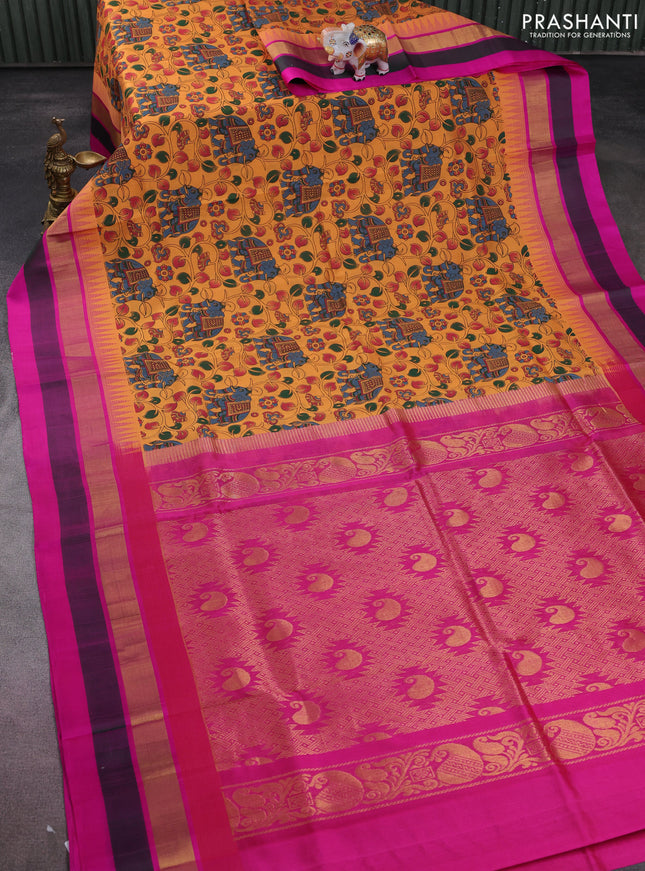 Silk cotton saree orange and pink with allover kalamkari prints and temple design zari woven simple border