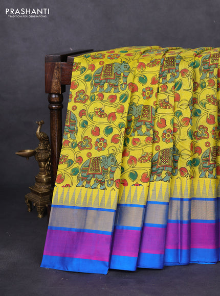 Silk cotton saree yellow and cs blue with allover kalamkari prints and temple design zari woven simple border