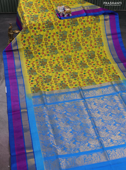 Silk cotton saree yellow and cs blue with allover kalamkari prints and temple design zari woven simple border