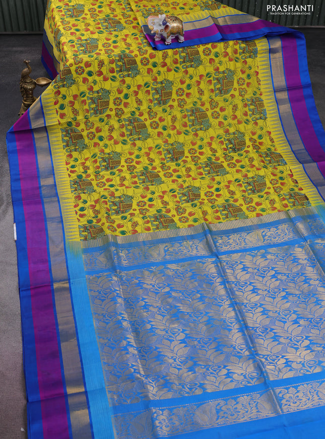 Silk cotton saree yellow and cs blue with allover kalamkari prints and temple design zari woven simple border