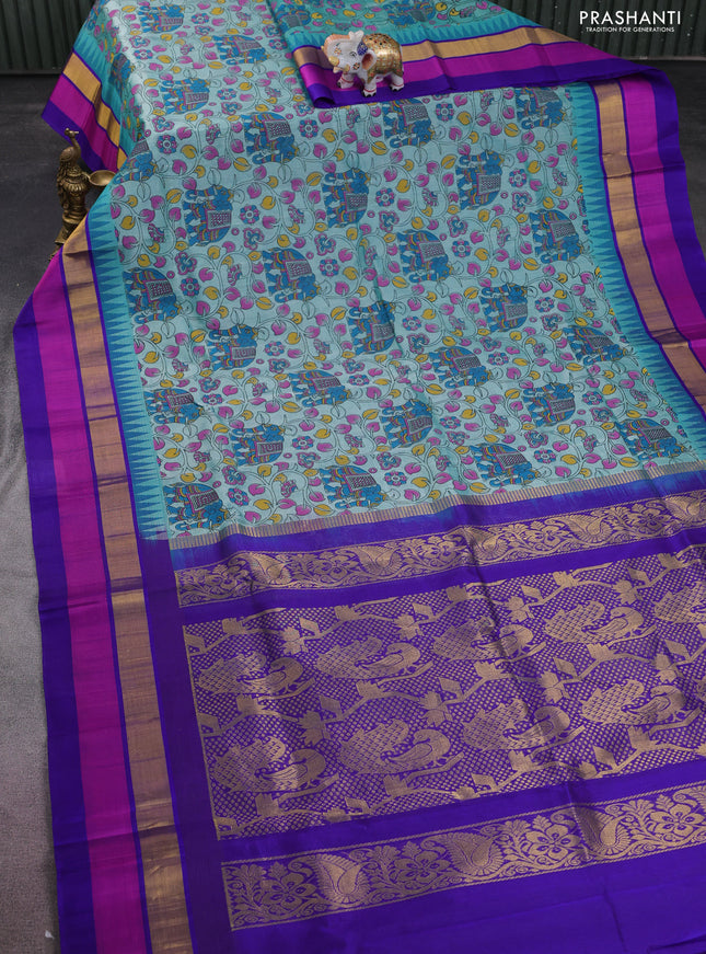 Silk cotton saree teal blue and violet shade with allover kalamkari prints and temple design zari woven simple border