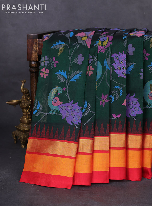 Silk cotton saree bottle green and red with allover kalamkari prints and temple design zari woven simple border