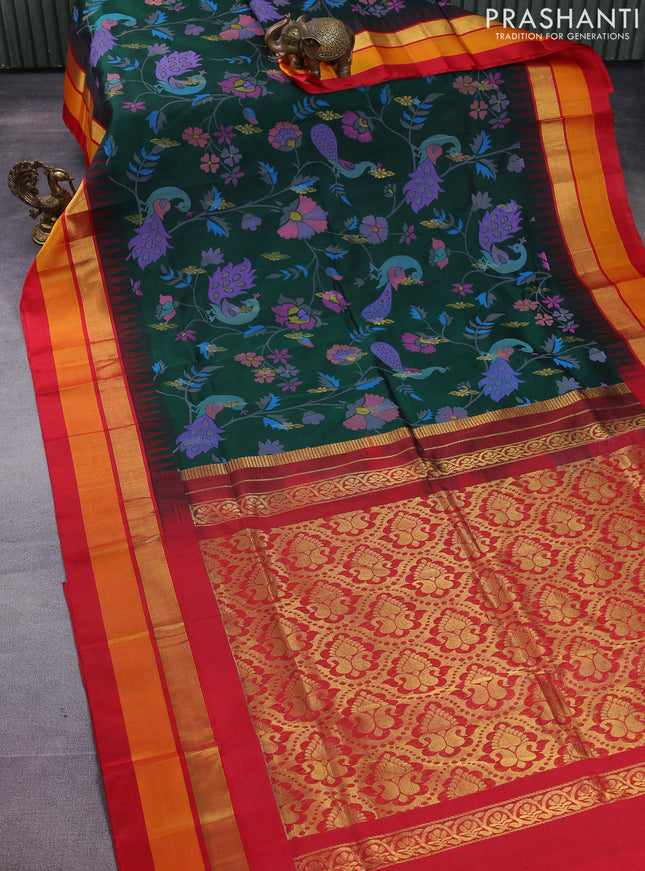 Silk cotton saree bottle green and red with allover kalamkari prints and temple design zari woven simple border