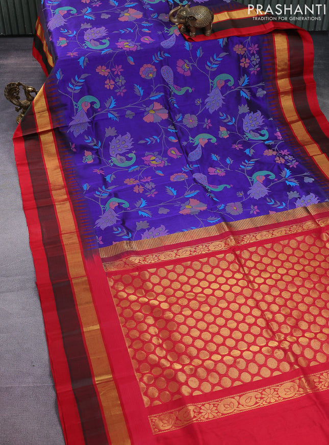 Silk cotton saree blue and red with allover kalamkari prints and temple design zari woven simple border
