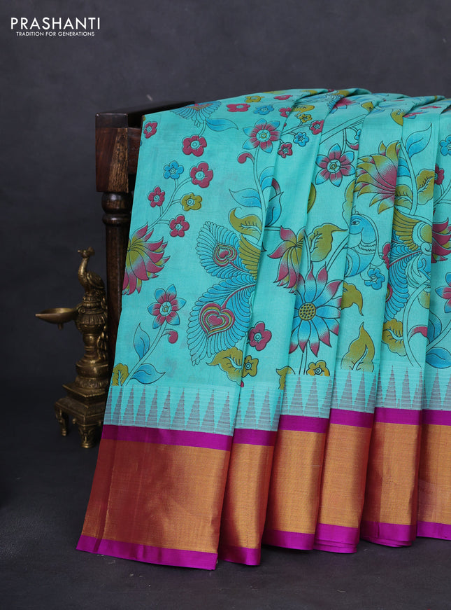 Silk cotton saree teal blue and purple with allover kalamkari prints and temple design zari woven simple border