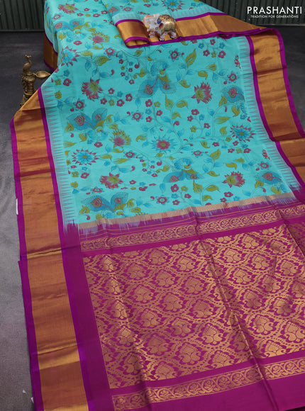 Silk cotton saree teal blue and purple with allover kalamkari prints and temple design zari woven simple border