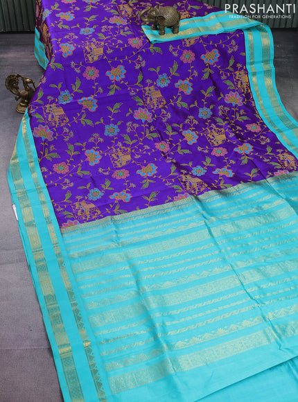 Silk cotton saree violet and teal blue with allover kalamkari prints and rettapet zari woven korvai border