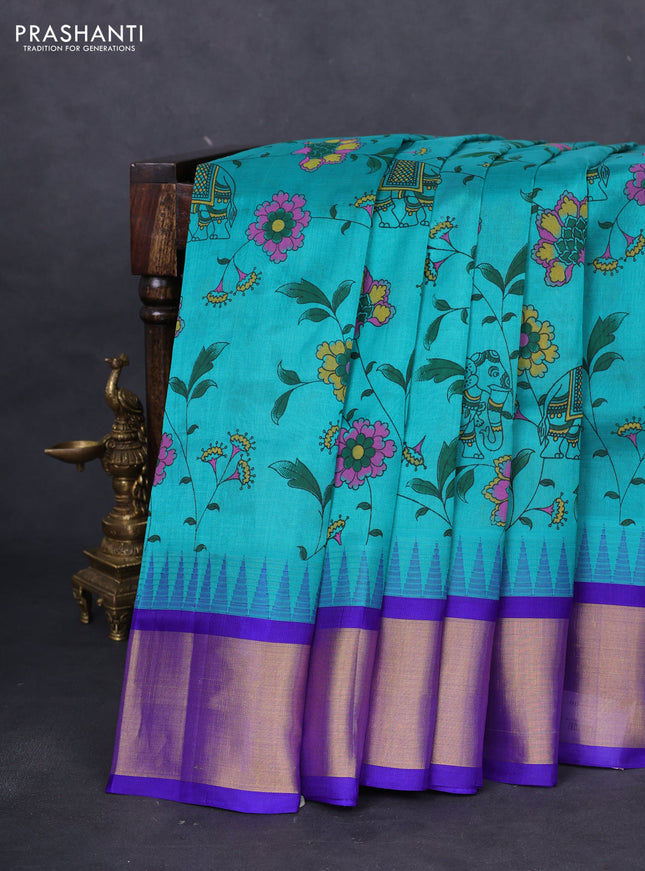 Silk cotton saree teal blue and violet with allover kalamkari prints and temple design zari woven simple border