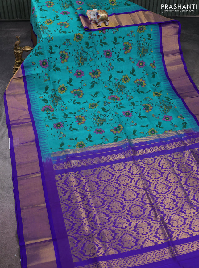Silk cotton saree teal blue and violet with allover kalamkari prints and temple design zari woven simple border
