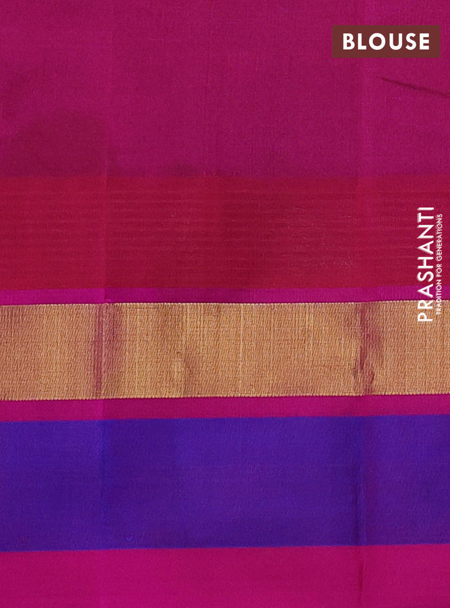 Silk cotton saree bottle green and pink with allover kalamkari prints and temple design zari woven simple border