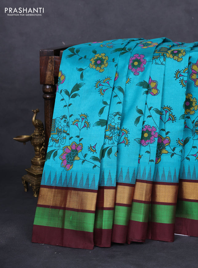 Silk cotton saree teal blue and deep maroon with allover kalamkari prints and temple design zari woven simple border