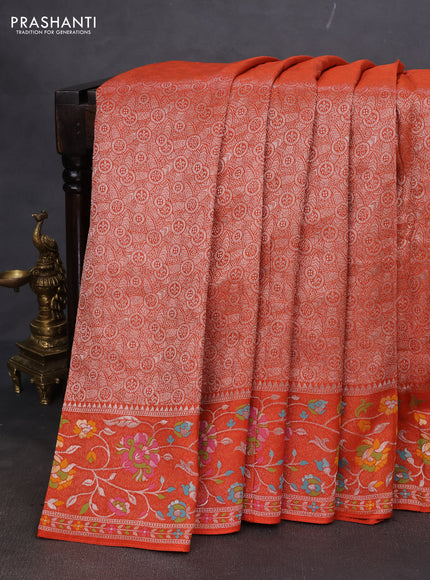 Banarasi semi raw silk saree orange with allover silver zari woven brocade weaves and floral design paithani border