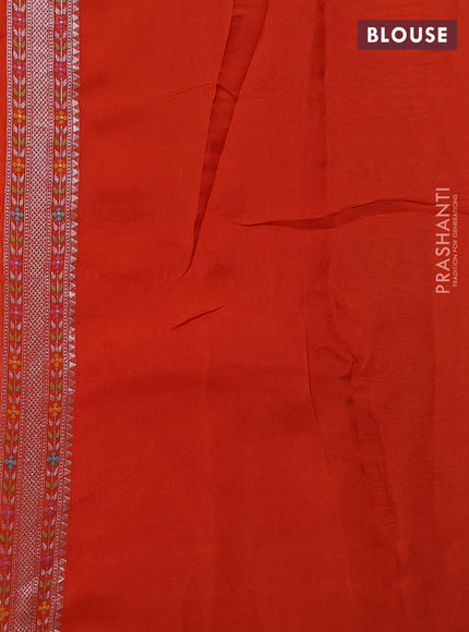 Banarasi semi raw silk saree orange with allover silver zari woven brocade weaves and floral design paithani border