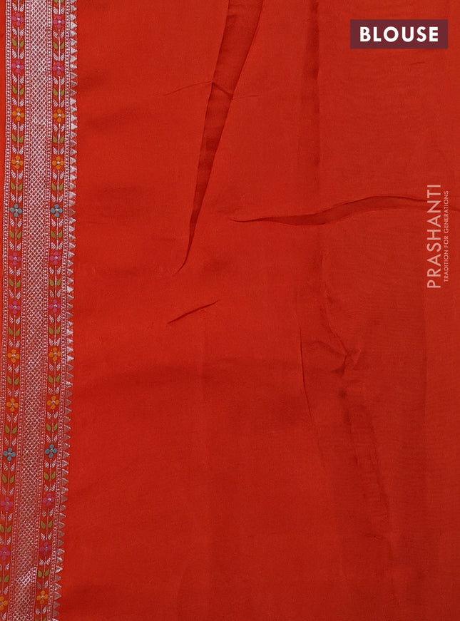 Banarasi semi raw silk saree orange with allover silver zari woven brocade weaves and floral design paithani border