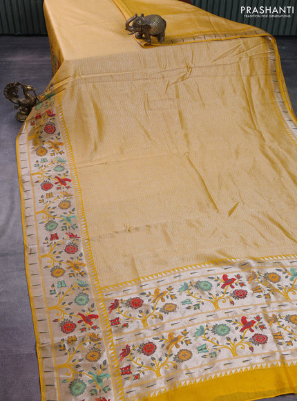 Banarasi semi raw silk saree yellow with allover zari woven brocade weaves and floral design paithani border