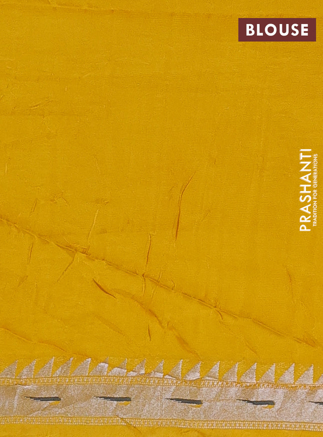 Banarasi semi raw silk saree yellow with allover zari woven brocade weaves and floral design paithani border