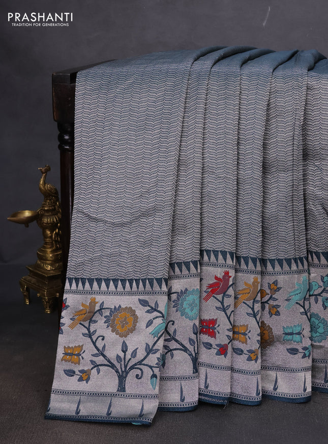 Banarasi semi raw silk saree peacock blue with allover zari woven brocade weaves and floral design paithani border