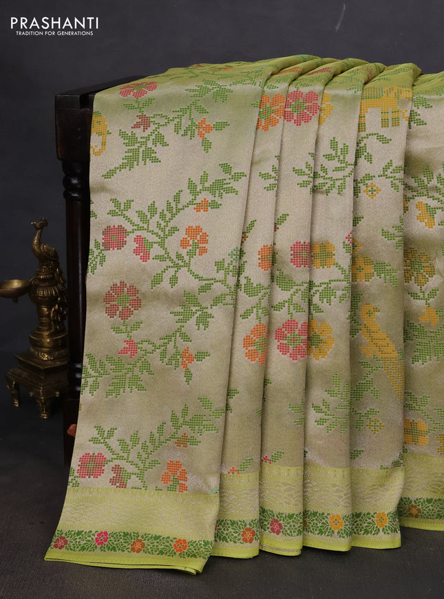 Banarasi semi raw silk saree fluorescent green with allover silver zari woven paithani weaves and woven border