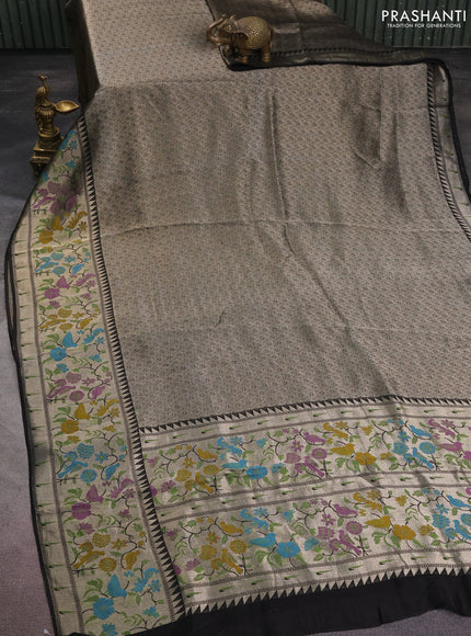 Banarasi semi raw silk saree black with allover silver woven brocade weaves and floral design paithani border
