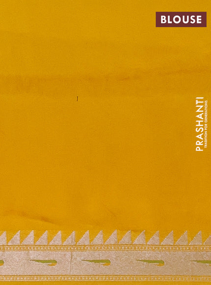 Banarasi semi raw silk saree yellow with allover silver woven brocade weaves and floral design paithani border