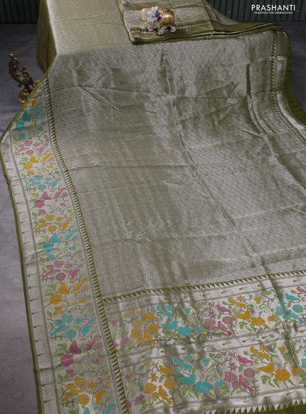 Banarasi semi raw silk saree mehendi green with allover silver woven brocade weaves and floral design paithani border