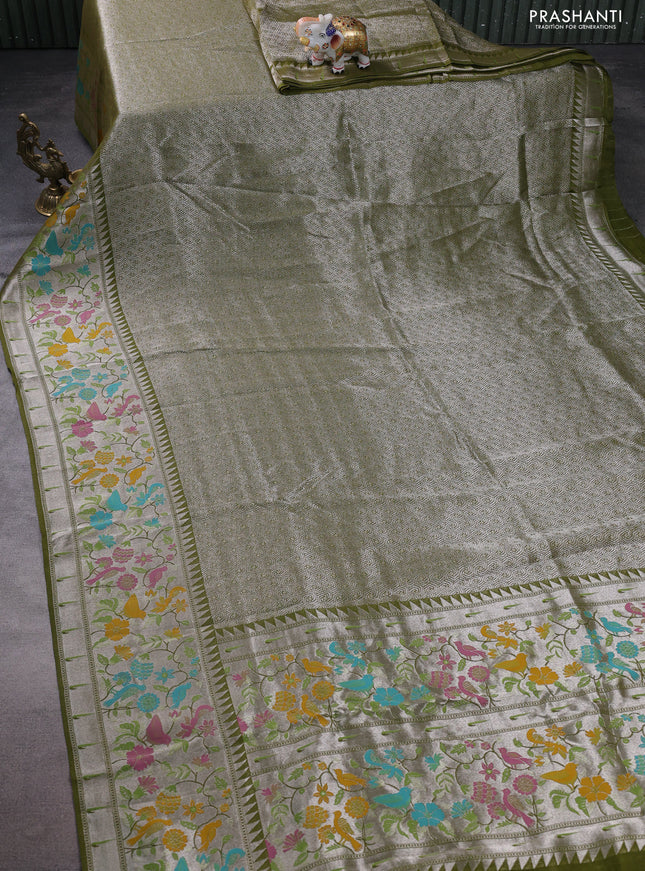 Banarasi semi raw silk saree mehendi green with allover silver woven brocade weaves and floral design paithani border