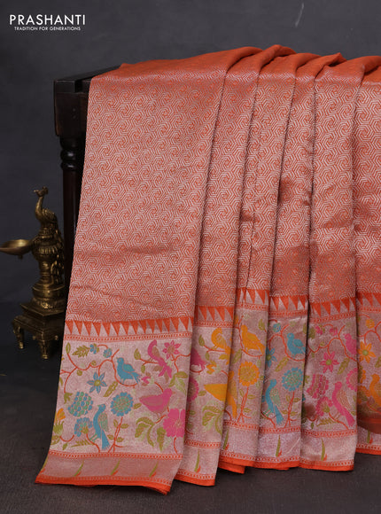 Banarasi semi raw silk saree orange with allover silver woven brocade weaves and floral design paithani border