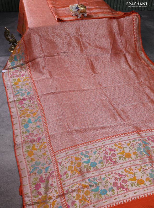 Banarasi semi raw silk saree orange with allover silver woven brocade weaves and floral design paithani border