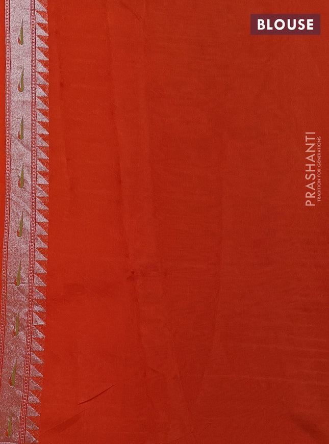Banarasi semi raw silk saree orange with allover silver woven brocade weaves and floral design paithani border